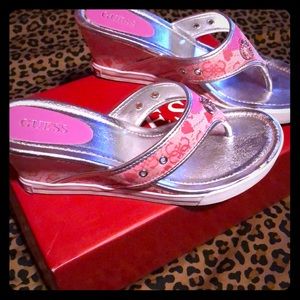 Guess pink sandal wedge size 7 1/2. Worn twice.